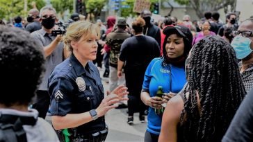 california police officer george floyd protesters los angeles city hall street black lives matter sign