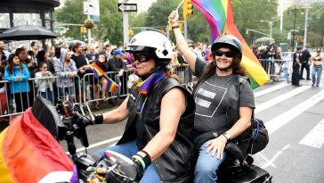 lgbtq pride parade dykes on bikes hrc equality shirt rainbow flags