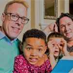 mixed race gay adoptive family