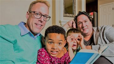 mixed race gay adoptive family