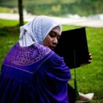 "Como Aina Abdul Pode Transformar Apoio de Khadijah Ibrahim em Sucesso na Indústria Musical?"
