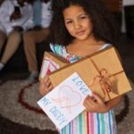 "Como Anitta Está Transformando Vidas em Angola e o Que Isso Revela Sobre Sua Influência Social"