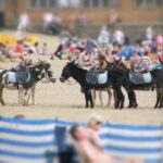 "Shaboozey no Kentucky Derby: Como a Música e a Filantropia Se Encontram em um Evento Exclusivo"