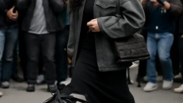 Rihanna apoia o parceiro com estilo único usando tênis da colaboração com Puma em Paris